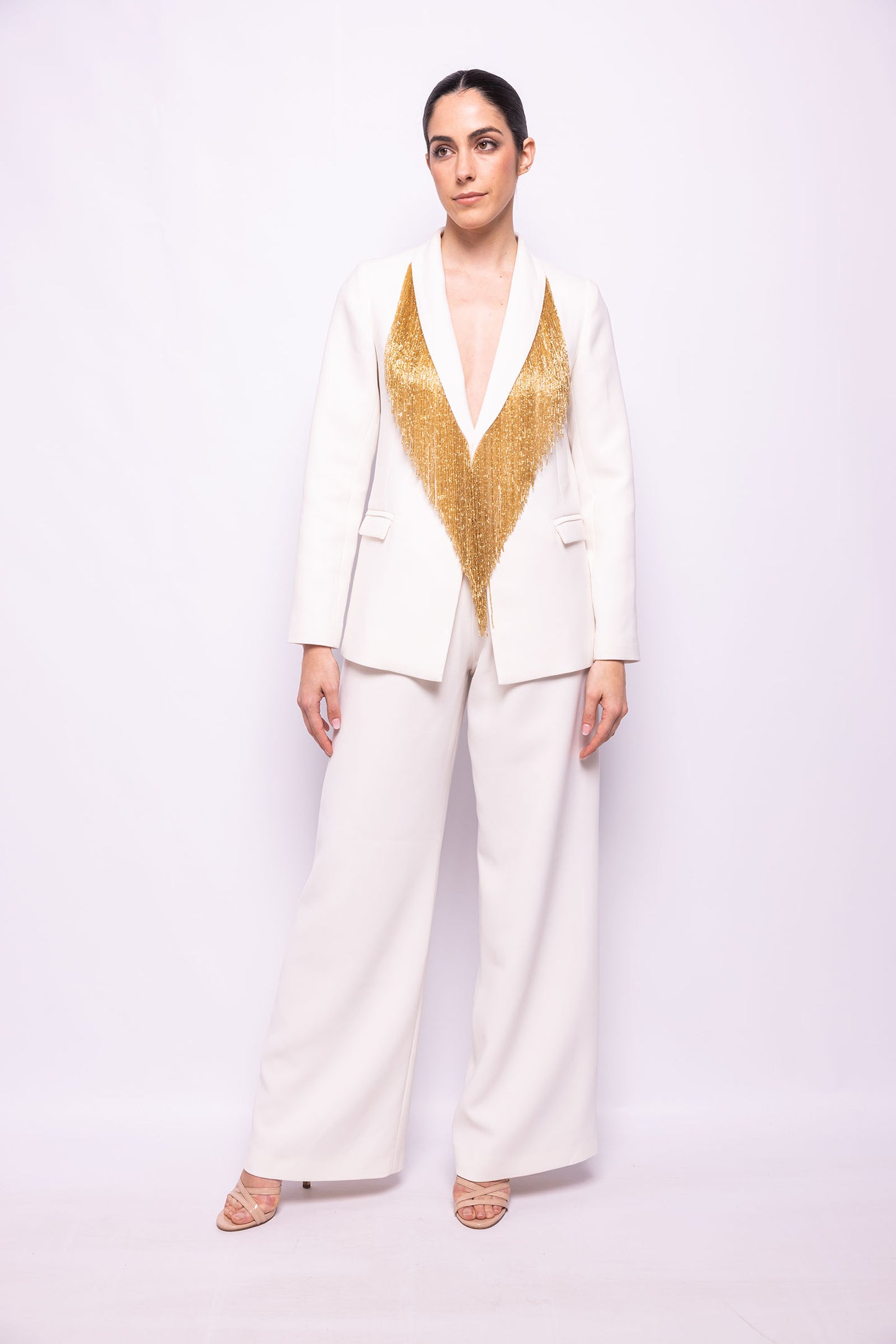 TRAJE DE CHAQUETA DE SASTRERÍA CON FLECO DE CANUTILLO